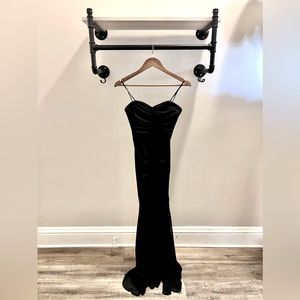 Black, strapless chiffon gown with sheer trail, by Max & Cleo. Size 2.